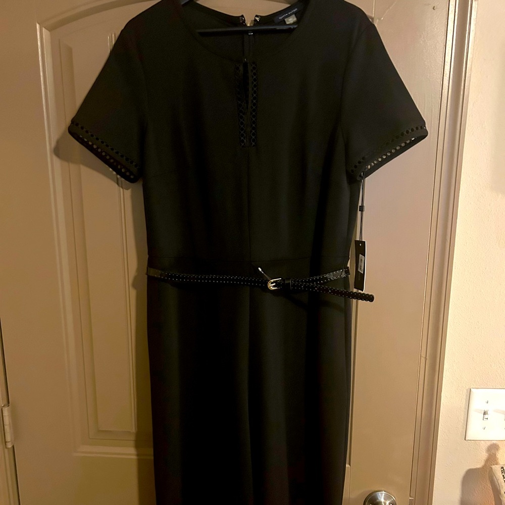 Tommy Hilfiger brand new Black Jumpsuit. Beautiful detail cutout pattern.